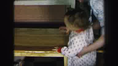 Lynbrook New York (1975): Two Toddlers In Red Polka Dot Pajamas Sitting At Wooden