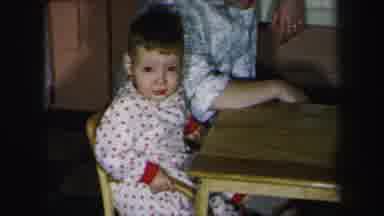 Lynbrook New York (1975): Two Little Boys In Pajamas Sitting At A Small Wooden