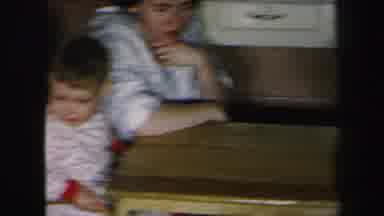 Lynbrook New York (1975): Twins Sitting At Table With Mom And Then Opening