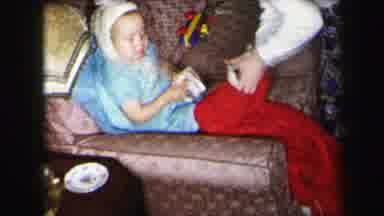 Lynbrook New York (1975): Mother Putting On Snow Gear