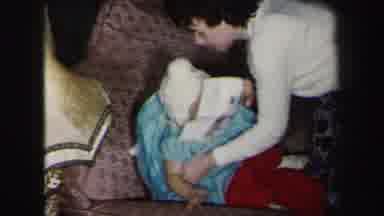 Lynbrook New York (1975): Baby Smiling And Having Fun Playing On The Couch With