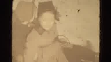 Lincoln Nebraska USA (1975): Grown Man Pulling Two Children On A Sleigh Behind Him