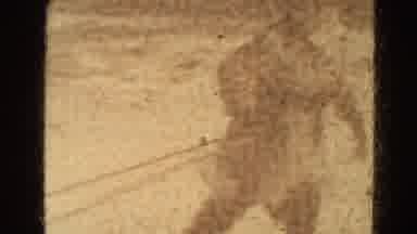 Lincoln Nebraska USA (1975): A Boy Walking And Limping And A Boy Being Pulled On