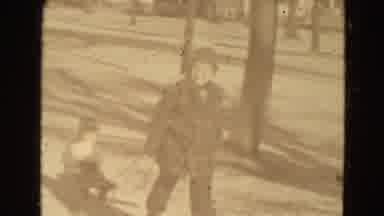 Lincoln Nebraska USA (1975): Oldest Brother Pulling Youngest Brother By Cart In