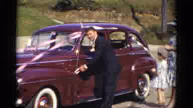 Bridgeport Connecticut (1975): Persons Are Standing Near The Car