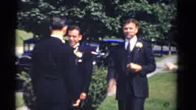 Bridgeport Connecticut (1975): Well Dressed Man Talking To A Group While Eating A