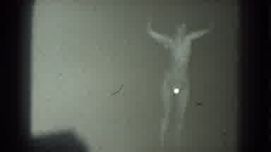 San Francisco California (1975): Topless Woman Dancing With Arms Raised Over Her