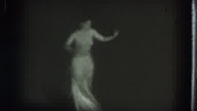 San Francisco California (1975): Dancing Woman In Shiny Fashionable Gown Is Center