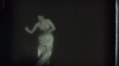San Francisco California (1975): A Topless With Her Dress Half Down Dances The