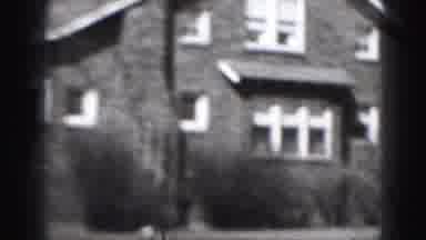 Harrisburg Pennsylvania USA (1975): House Is Being Filmed During A Windy Day