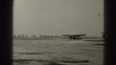 Harrisburg Pennsylvania USA (1975): Black And White Film Of Antique Plane Rolling