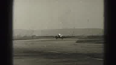 Harrisburg Pennsylvania USA (1975): A Large Passenger Airplane Slowly Taxiing Down