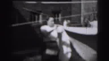 HARRISBURG PENNSYLVANIA USA-1975: Woman Hanging Laundry on Clothesline