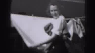 Harrisburg Pennsylvania USA (1975): Woman Wearing White Blouse And Skirt Smiles As
