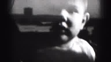 Harrisburg Pennsylvania USA (1975): Small Child Seen Through A Window Reflecting A