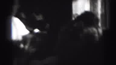 Harrisburg Pennsylvania USA (1975): Baby Drools While Carrying Object As Camera