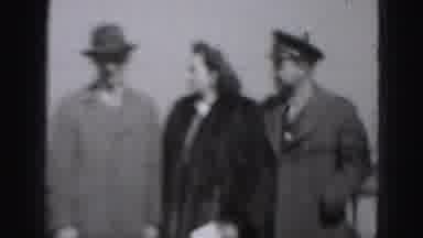 Harrisburg Pennsylvania USA (1975): Two Men In Suits One Woman Fur Coat Talking