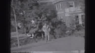 Harrisburg Pennsylvania USA (1975): Man Zooms Around The Lawn With A