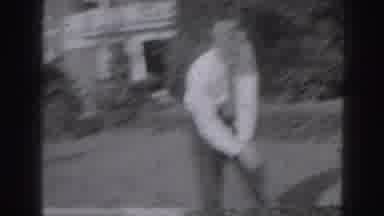 Harrisburg Pennsylvania USA (1975): Caucasian Male Golfer Swings Puck As Hard As