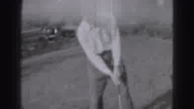 Harrisburg Pennsylvania USA (1975): Young Man Practices His Golf Swing In The