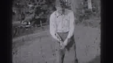 Harrisburg Pennsylvania USA (1975): Black And White Golfing Scene With Two Young