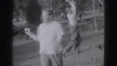 Harrisburg Pennsylvania USA (1975): Two Adult Men Having A Good Time Playing A