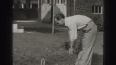 Harrisburg Pennsylvania USA (1975): Men Playing Tennis In Their Yard