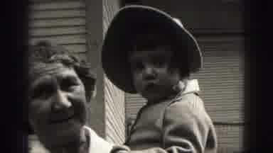 Harrisburg Pennsylvania USA (1975): Grandmother Taking A Picture With Her