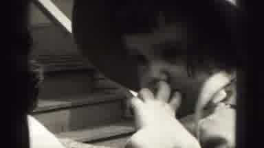 Harrisburg Pennsylvania USA (1975): Nervous Child Wearing A Hat Looking At Camera