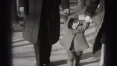 HARRISBURG PENNSYLVANIA USA-1975: Mother And Father Help Baby Learning To Walk