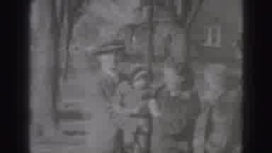 Harrisburg Pennsylvania USA-1975: Mother And Father Hold Their Baby And Make The