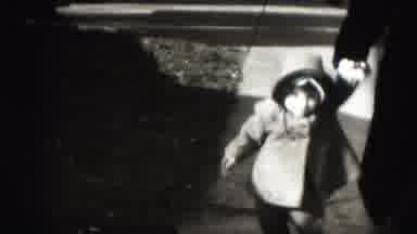 Harrisburg Pennsylvania USA (1975): A Little Girl Walking Down The Street With Her