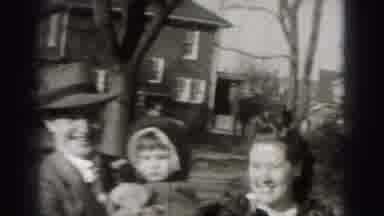 Harrisburg Pennsylvania USA (1975): Mother And Father Walk Towards The Camera With