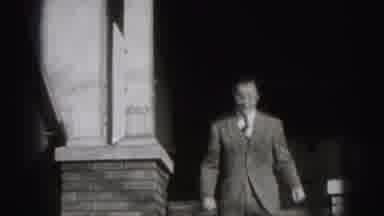 Harrisburg Pennsylvania USA (1975): Man In Suit Walking Down Steps Of Old House