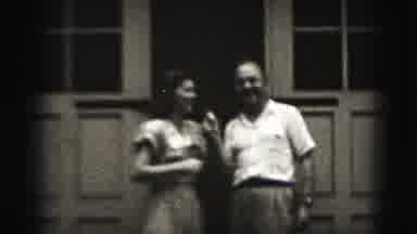 Harrisburg Pennsylvania USA (1975): Man And Woman Share A Microphone And Talk To