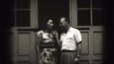 Harrisburg Pennsylvania USA (1975): Older Man Holding A Microphone Interviewing A