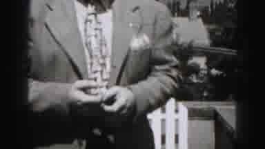 Harrisburg Pennsylvania USA (1975): A Well Dressed Man Walks Away Towards A White