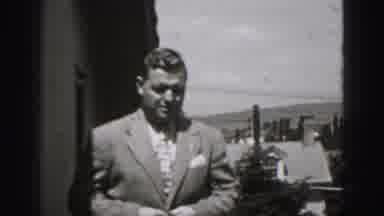 Harrisburg Pennsylvania USA (1975): A Tidy Man Outside And Fixing His Suit So That