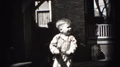 Harrisburg Pennsylvania USA (1975): Kid Standing With Fingers In His Mouth