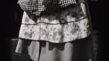 Harrisburg Pennsylvania USA (1975): Lady In A Dress And Apron Standing In The