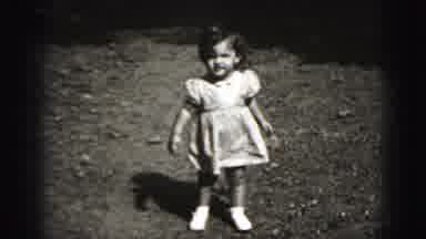Harrisburg Pennsylvania USA (1975): Little Girl Toddler Walks Towards The Camera
