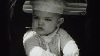 Harrisburg Pennsylvania USA (1975): An Angry Looking Baby That's Dressed Nice