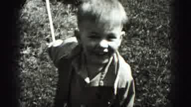 Harrisburg Pennsylvania USA (1975): Young Child Tugging Rope In Grass Field
