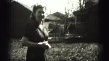 Harrisburg Pennsylvania USA (1975): Women Wave At Camera While Standing In Field