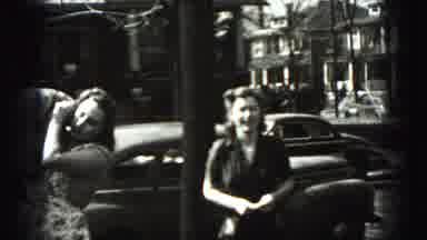 Harrisburg Pennsylvania USA (1975): A Woman Speaks To The Camera As Another