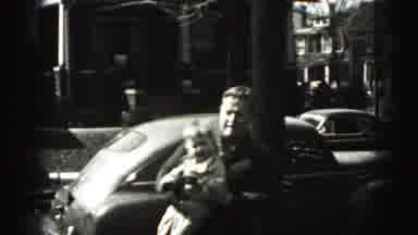 Harrisburg Pennsylvania USA (1975): A Man Playing With His Son Outside