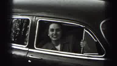 Harrisburg Pennsylvania USA (1975): Woman In Antique Car Speaks To The Camera And