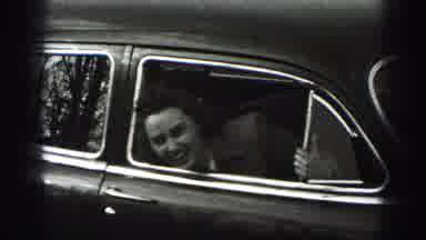 Harrisburg Pennsylvania USA (1975): Smiling Woman Leaning Out Of A Vintage Car And