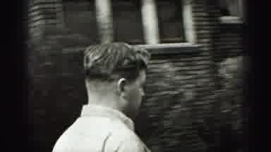 Harrisburg Pennsylvania USA (1975): Young Man Walks Towards A Young Woman Who Is