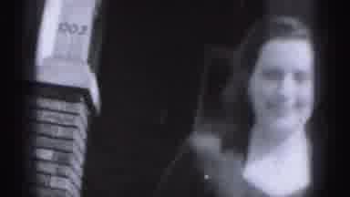 Harrisburg Pennsylvania USA (1975): Woman Walks Down Stairs To Wave At Camera On